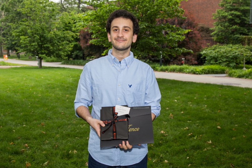 Ariel Schvartzman Cohenca stands with his Graduate Student Teaching Award