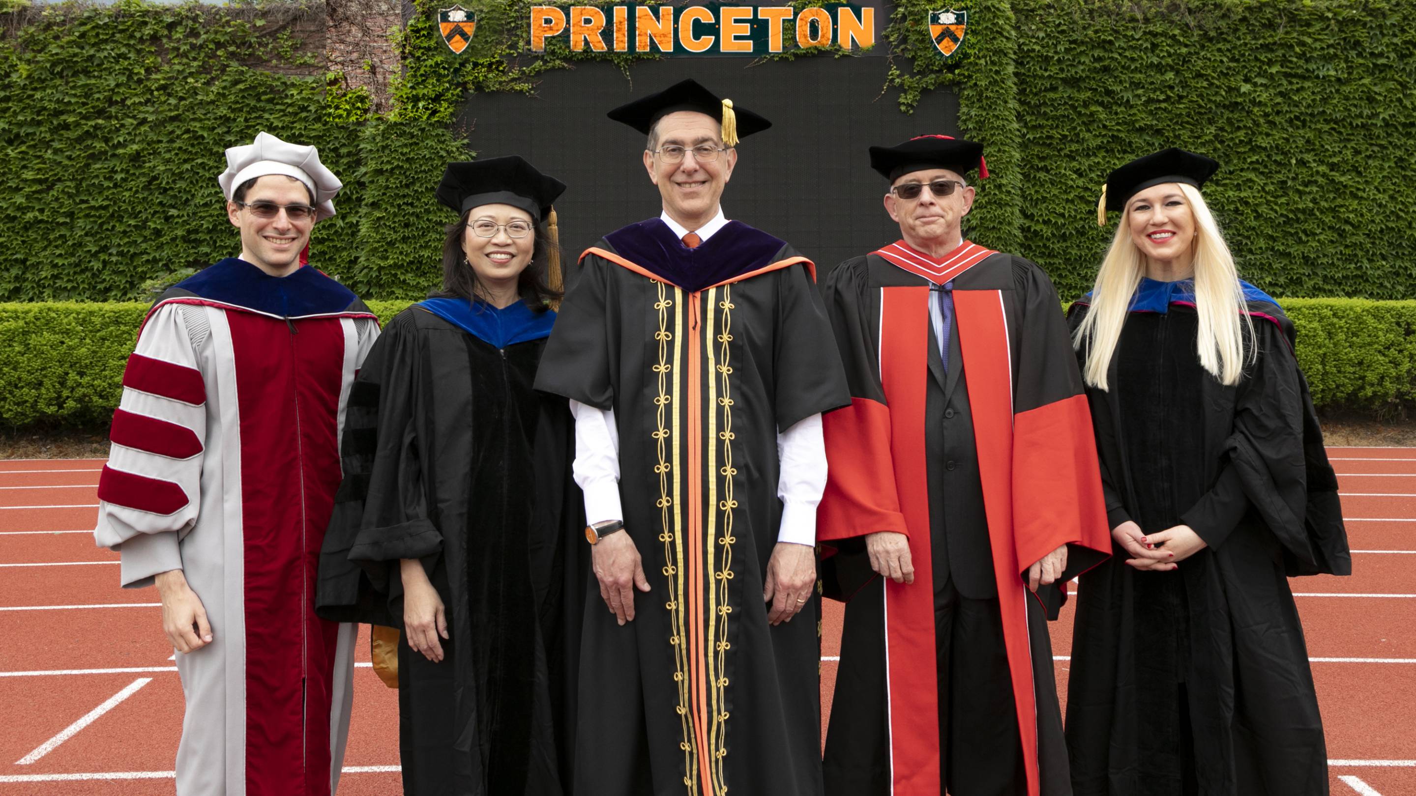 President Christopher L. Eisgruber poses with the recipients of awards for sustained excellence in undergraduate and graduate teaching by Princeton University faculty members. 