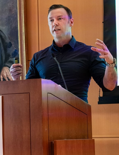 Ryan Adams speaking at a podium