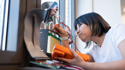 grad student working on hardware
