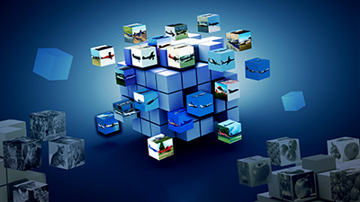 3. A blue cube adorned with multiple images, presenting a variety of themes and colors on its different faces.