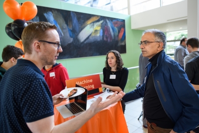 Students and professors speaking at the 2019 advising fair